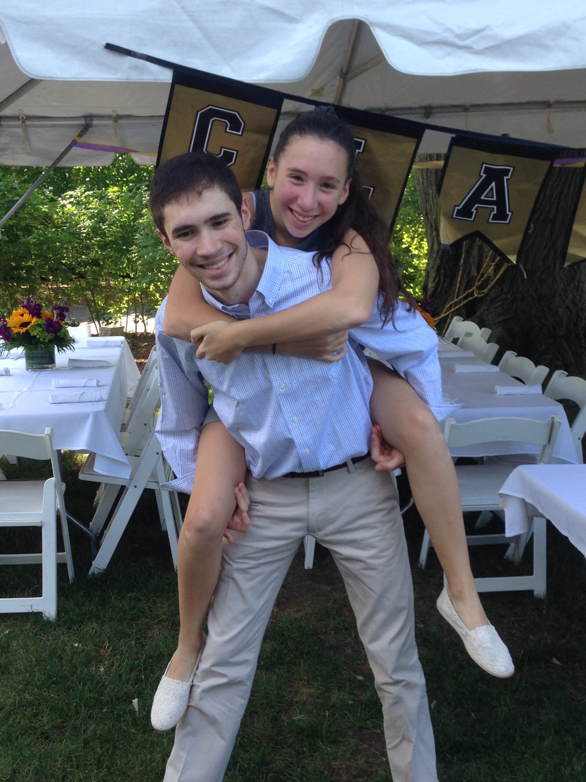 A picture of Tyler back when the hair was short. High school graduation party, 2017.